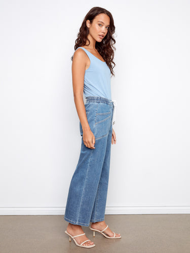 Featuring practical patch pockets, these denim pants combine functionality with modern style effortlessly by Charlie B.