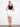 This skirt features a slim fit design with built-in shorts, offering comfort and style for any occasion by Charlie B.