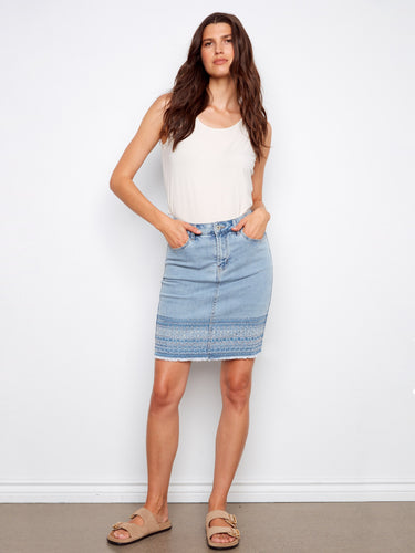 Denim skirt featuring a slim fit and stylish embroidered hem, perfect for casual outings by Charlie B.