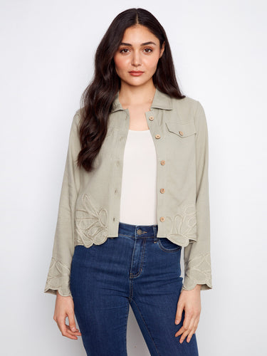 The front button closure offers both style and functionality, making it an essential addition to your wardrobe. Elegance defined by Charlie B.