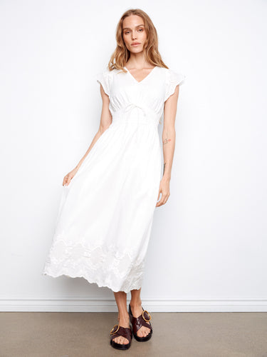 Elegant white dress with ruffle cap sleeves and an embroidered border for added charm by Charlie B.