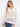 White fishnet hoodie sweater featuring a gold lurex heart design, ideal for layering. By Charlie B.