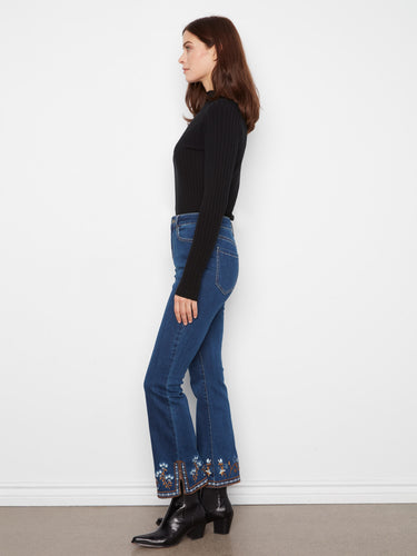 The side slits at the hem add a unique touch to these denim jeans, enhancing your style effortlessly. By Charlie B.