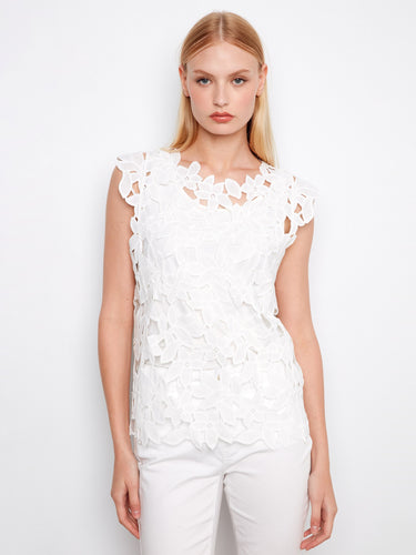 This elegant top features a crew neckline, adding a touch of sophistication to any outfit. Perfect for casual or formal occasions by Charlie B.
