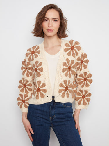 Ecru crochet cardigan with a relaxed fit, showcasing large floral motifs and long sleeves by Charlie B.