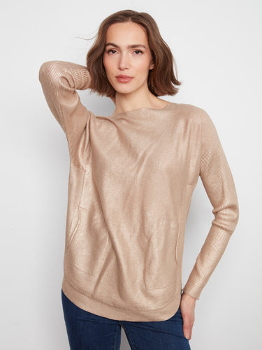 Sweater featuring a chic boat neck design and metallic finish, perfect for adding a touch of elegance to any outfit. By Charlie B.