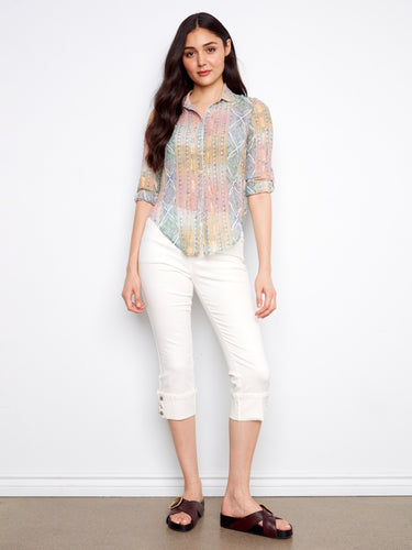 This stylish shirt has roll-up sleeves, adding a casual yet chic element to the overall look. The fabric drapes beautifully. By Charlie B.