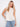 This top features a stylish scoop neckline, perfect for any casual outing. Designed by Charlie B.