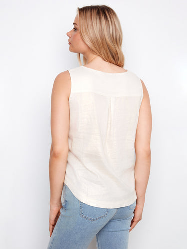 Adorned with an elegant foil print design, this top brings shimmer to your wardrobe. By Charlie B.