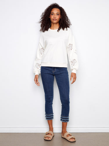 This sweater showcases long sleeves crafted from stretch cotton for ultimate comfort and style by Charlie B.