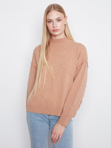 Sweater with a stylish mock neck, perfect for layering and adding warmth to your outfit. By Charlie B.
