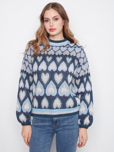 Navy sweater featuring a drop shoulder design with heart jacquard pattern by Charlie B.
