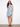 Embrace elegance with a Henley neckline dress featuring a charming floral pattern, perfect for any occasion by Charlie B.