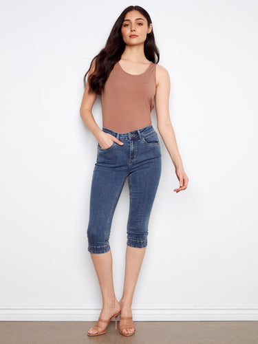Blue capri jeans featuring stretch denim and a regular rise, perfect for casual outings by Charlie B.