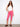 These vibrant pink pants feature a slim fit design with a flattering knee length, perfect for casual outings. By Charlie B.