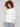 Ecru knit sweater featuring a stylish boat neck and round hem, perfect for any occasion by Charlie B.