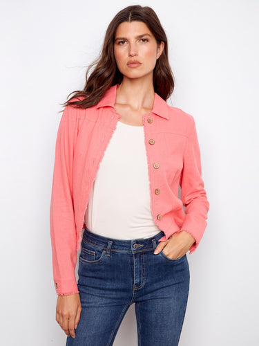 Vibrant pink jacket showcasing frayed edges for a trendy look. Ideal for adding flair to your wardrobe by Charlie B.