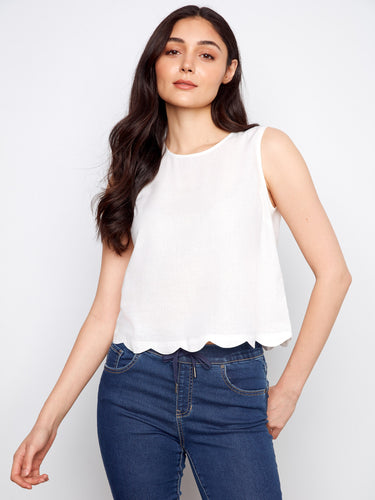 This top features a loose fit, offering comfort and style for any occasion. Perfect for casual outings or relaxed settings by Charlie B.