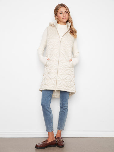 This stylish vest features a quilted design, adding texture and warmth to any outfit. Perfect for layering on cooler days by Charlie B.