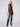 Mocha faux leather vest featuring a rib knit neck and stylish snap button front closure, perfect for layering by Charlie B.