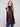 Quilted mocha vest with convenient welt pockets, offering both style and practicality for the modern wardrobe by Charlie B.