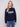 Navy sweater with 'amour' graphic and mock neck, showcasing flecked yarn texture by Charlie B.