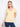 This yellow t-shirt features a flattering V-neck, perfect for casual outings. Made with lightweight cotton for comfort. By Charlie B.