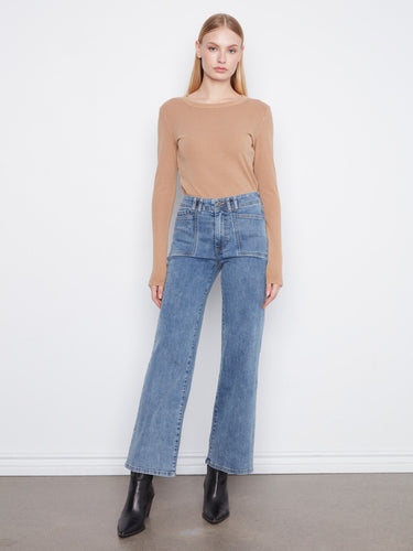These jeans feature a wide leg design, offering a stylish and comfortable fit for any occasion by Charlie B.