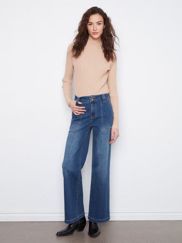 These jeans feature a wide leg design, offering a relaxed and stylish fit for any casual occasion. By Charlie B.