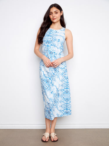 Stylish dress with a faux knot detail, adding elegance to the blue geometric pattern. Crafted in 100% cotton by Charlie B.