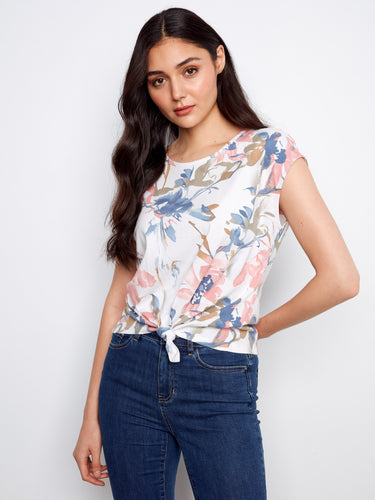 Floral printed top with a crew neckline and cap sleeves, offering a chic touch to any outfit by Charlie B.