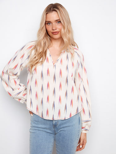 Ikat print cotton blouse features elastic cuffs for a comfortable fit, enhancing the casual elegance of your look by Charlie B.