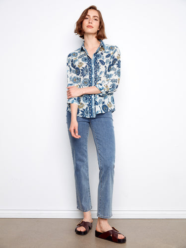 This lightweight cotton shirt with a floral pattern offers comfort and style. Ideal for warm days or layering in cooler weather by Charlie B.