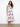Floral dress featuring a stylish V-neck design, perfect for any occasion. The vibrant pattern adds a touch of elegance by Charlie B.