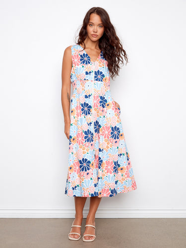 Floral dress featuring a stylish V-neck design, perfect for any occasion. The vibrant pattern adds a touch of elegance by Charlie B.