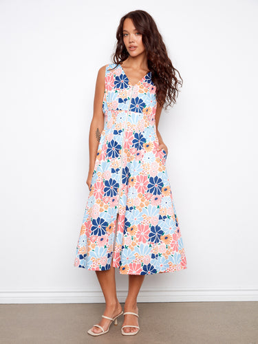 This charming floral dress has a convenient front-zip closure, making it both fashionable and functional by Charlie B.