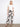 Wide-leg pants in a black and white leaf design, featuring a cropped length for a chic look by Charlie B.