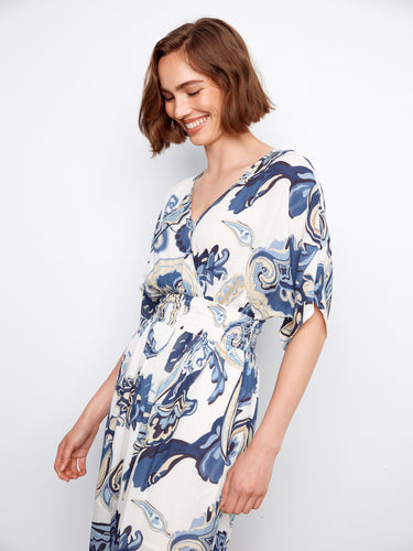 Stylish short dolman sleeves add flair to this beautifully patterned maxi dress by Charlie B.
