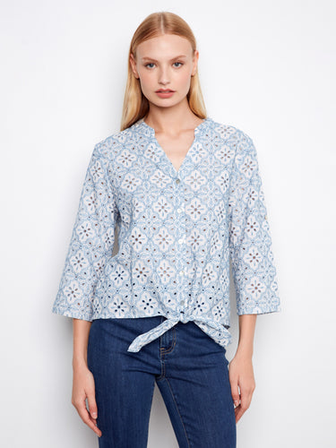 Chic blue blouse with 3/4 roll-up sleeves and delicate embroidery for a versatile look by Charlie B.