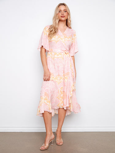 Floral dress with a flattering V-neck and self-tie belt, perfect for summer occasions. Designed for style and comfort by Charlie B.