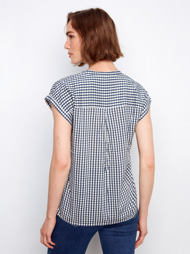 Navy gingham shirt with a modern V-neck and stand collar design, complete with cap sleeves by Charlie B.