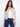 Floral jacket with a short length, featuring a chic button closure and stylish design. Perfect for casual outings. By Charlie B.