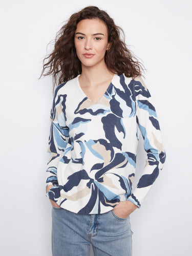 Stylish sweater with a V-neck, featuring a unique pattern and vibrant colors for a chic look by Charlie B.