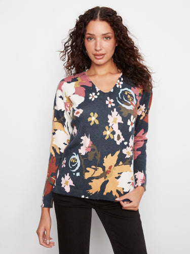 Floral sweater with a flattering V-neck, showcasing its elegant design by Charlie B.