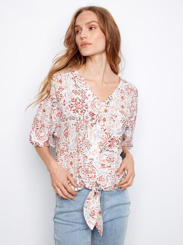 Women's printed blouse with a stylish V-neck and tie front, perfect for casual outings by Charlie B.