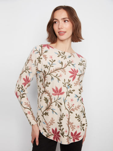 Floral top featuring a stylish boat neckline, perfect for casual outings. Designed by Charlie B.