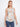 Floral sleeveless top with a scoop neckline, perfect for warm days. The design features a rounded hem for added style by Charlie B.