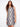 Dress featuring side button detail adds a unique touch to the overall look, enhancing its visual appeal. By Charlie B.