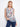 Abstract floral print top with ruffle neckline, offering a sleeveless design by Charlie B.