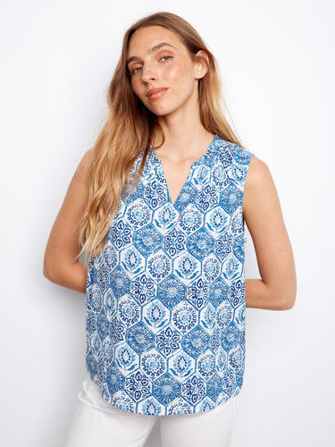 Elegant top with a V-neck, featuring a beautiful blue pattern and sleeveless design for a chic summer look by Charlie B.